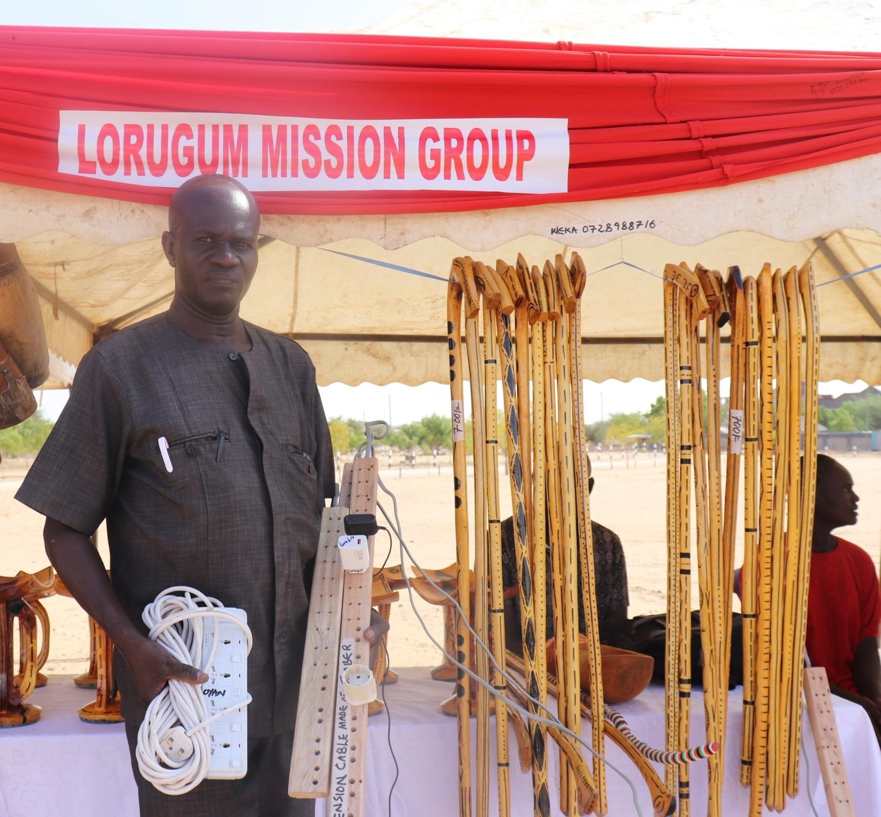 Vocational Training Teacher Showcases Wooden Extension Cable Innovation at Turkana Farmers' Field Day